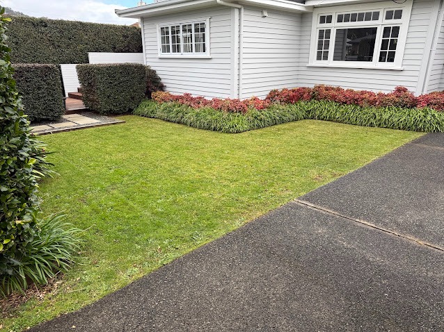 Villa front lawn with a tidy garden border, Whangarei